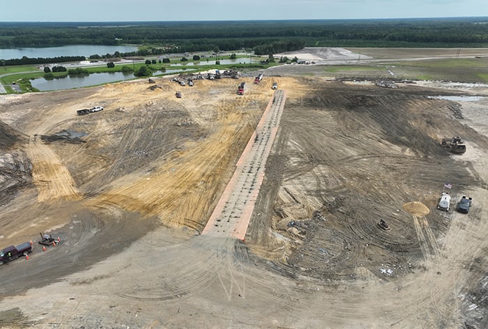 Heavy-duty construction mats for landfills