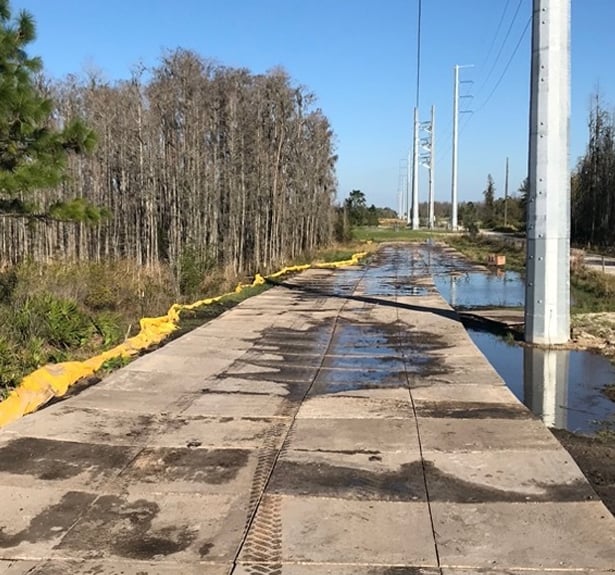 Reliable portable roadway using swamp mats