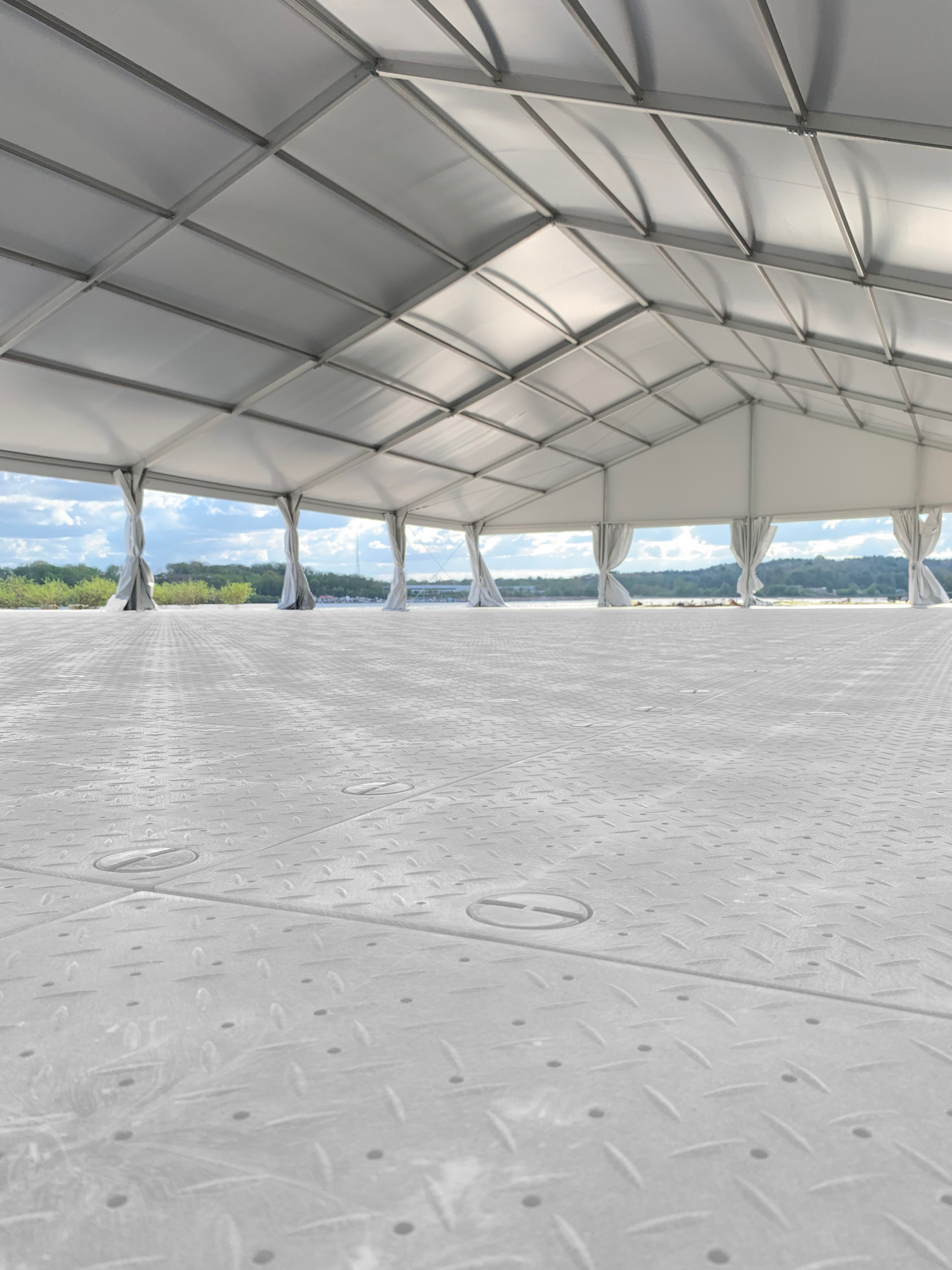 How Do Outdoor Events Protect Guests and Surfaces With Temporary Event Flooring?